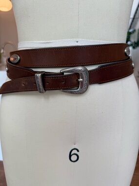 Vintage double wrap Brown western leather belt with silver buckle.